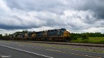 CSX 557 leading a mixed freight train